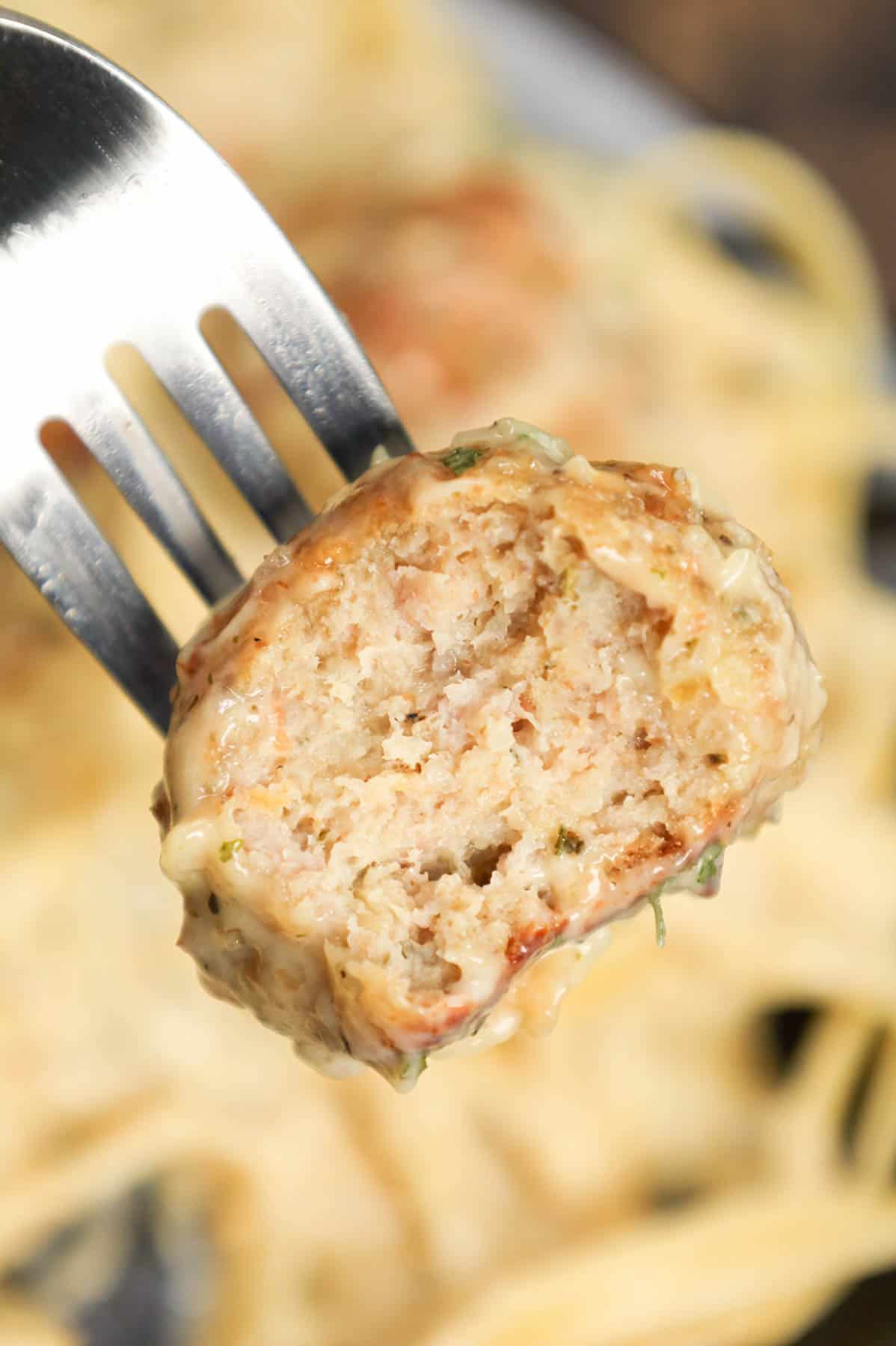 Alfredo Meatballs are an easy ground chicken meatball recipe loaded with Italian seasoned bread crumbs, garlic powder and parmesan cheese and tossed in a rich and creamy alfredo sauce.