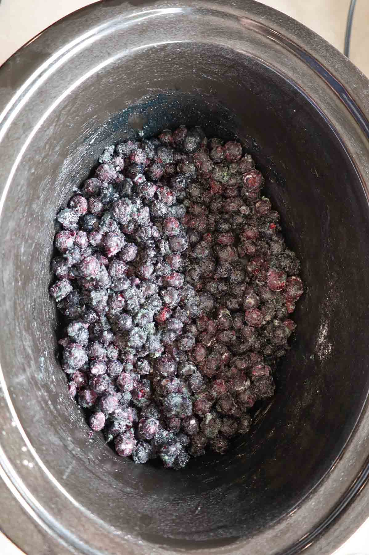 frozen blueberries, pudding mix and sugar stirred together in a crock pot