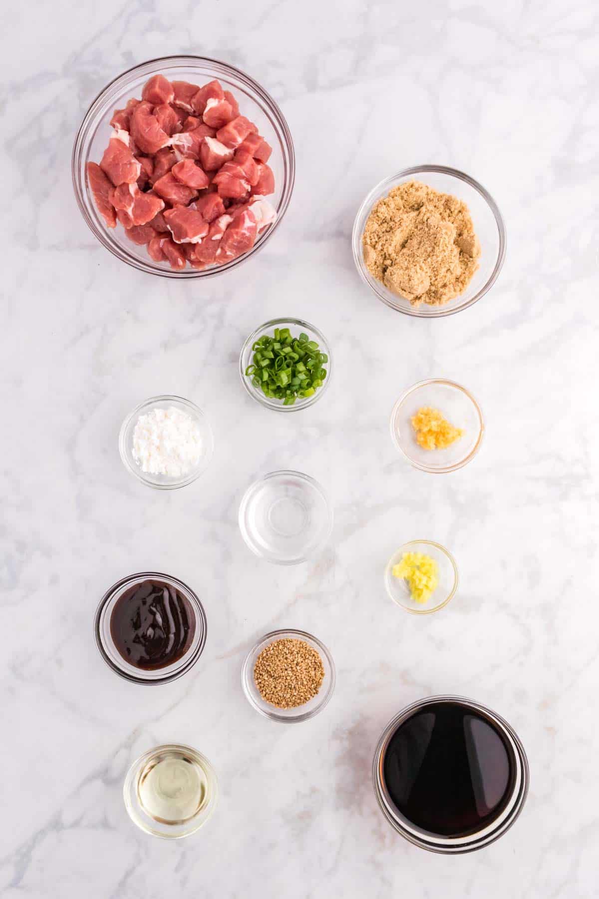 mongolian pork ingredients in prep bowls before cooking