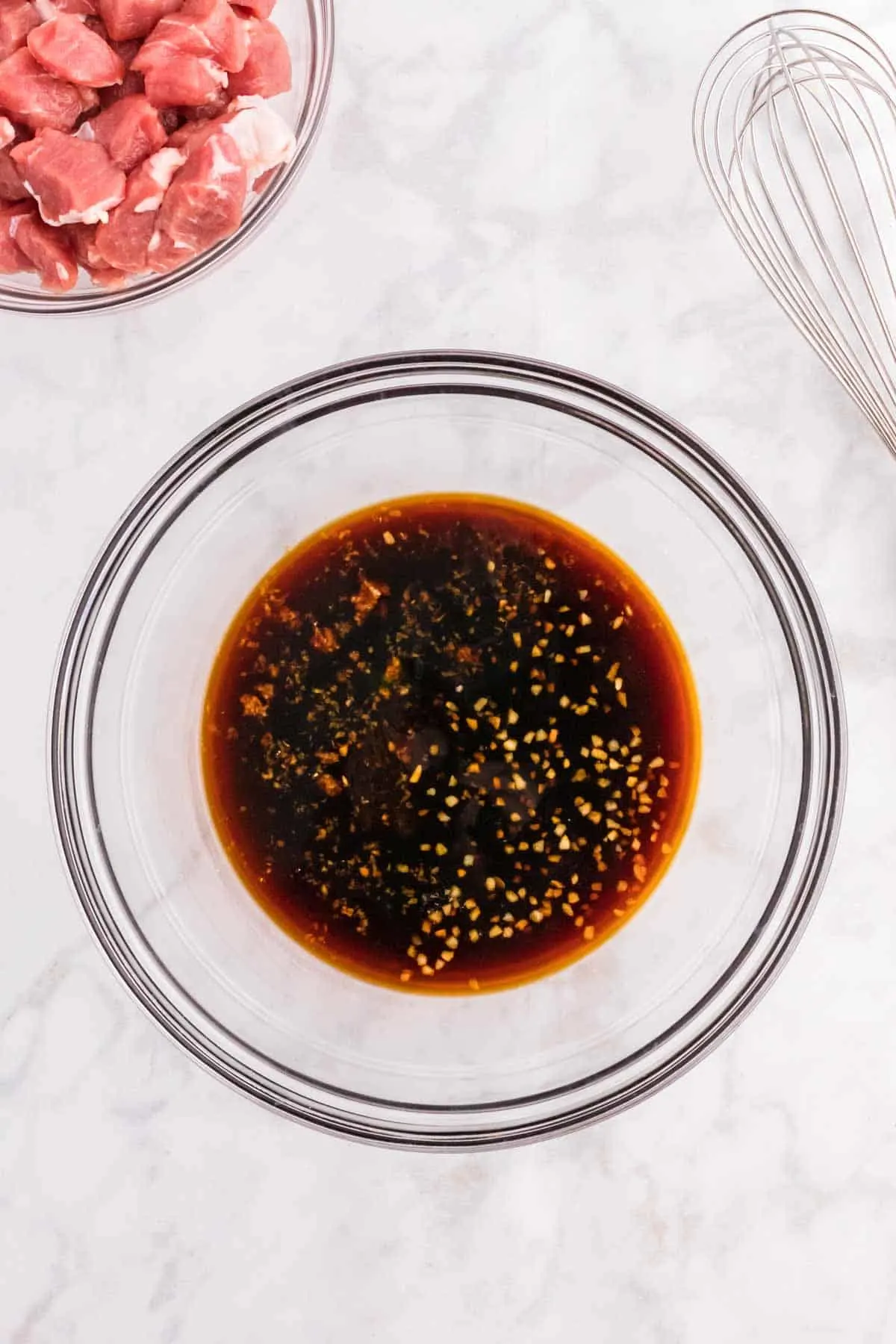 soy sauce, hoisin sauce, brown sugar, ginger and garlic in a mixing bowl