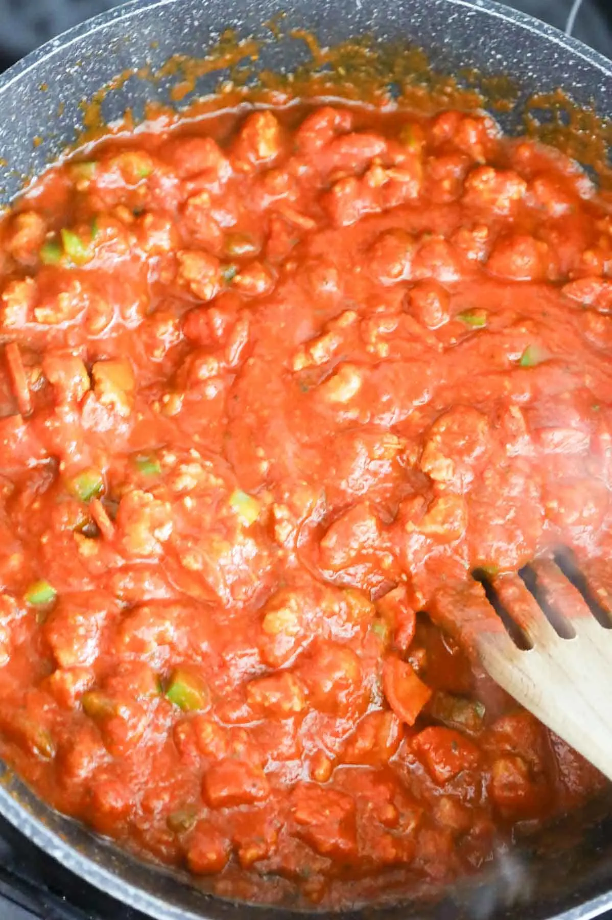 marinara sauce and meat mixture in a skillet