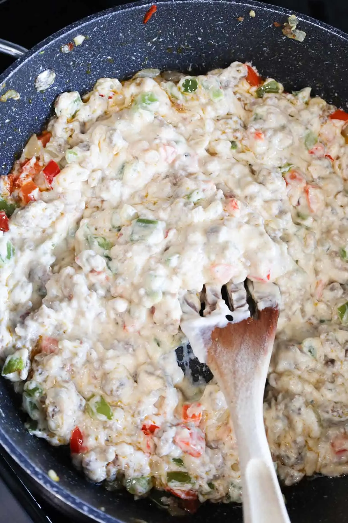 cream of mushroom soup and sausage mixture in a skillet