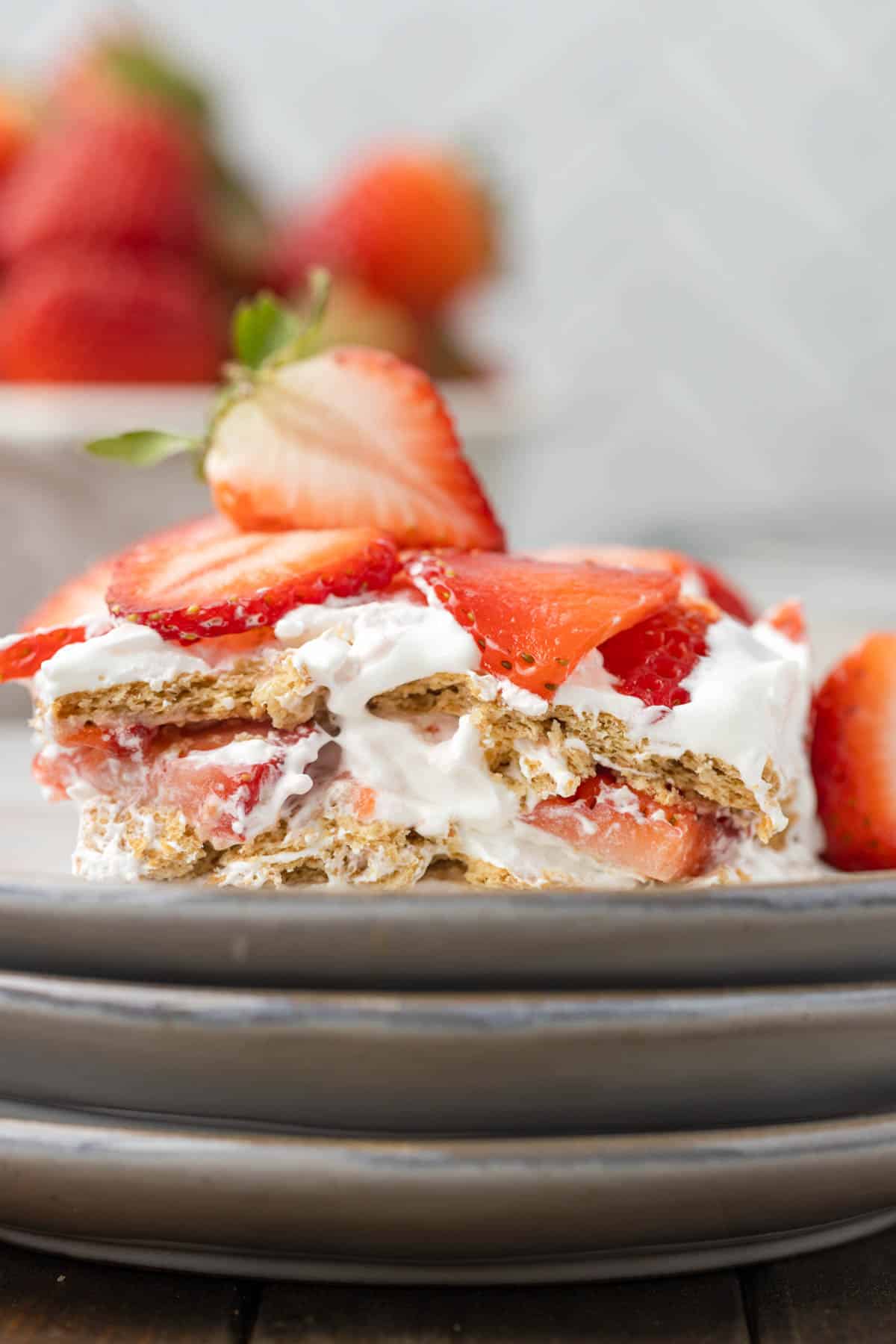 Strawberry Icebox Cake is a 3 ingredient no bake dessert recipe made with graham crackers, Cool Whip and fresh strawberries.