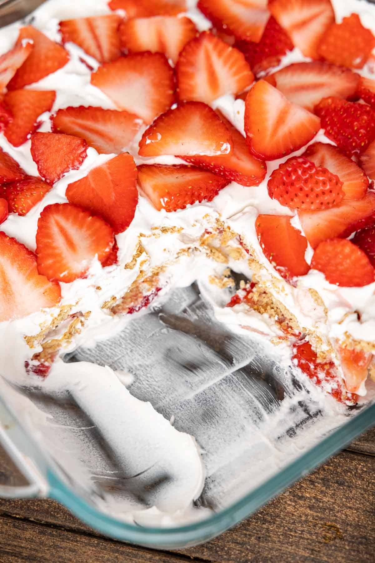 Strawberry Icebox Cake is a 3 ingredient no bake dessert recipe made with graham crackers, Cool Whip and fresh strawberries.