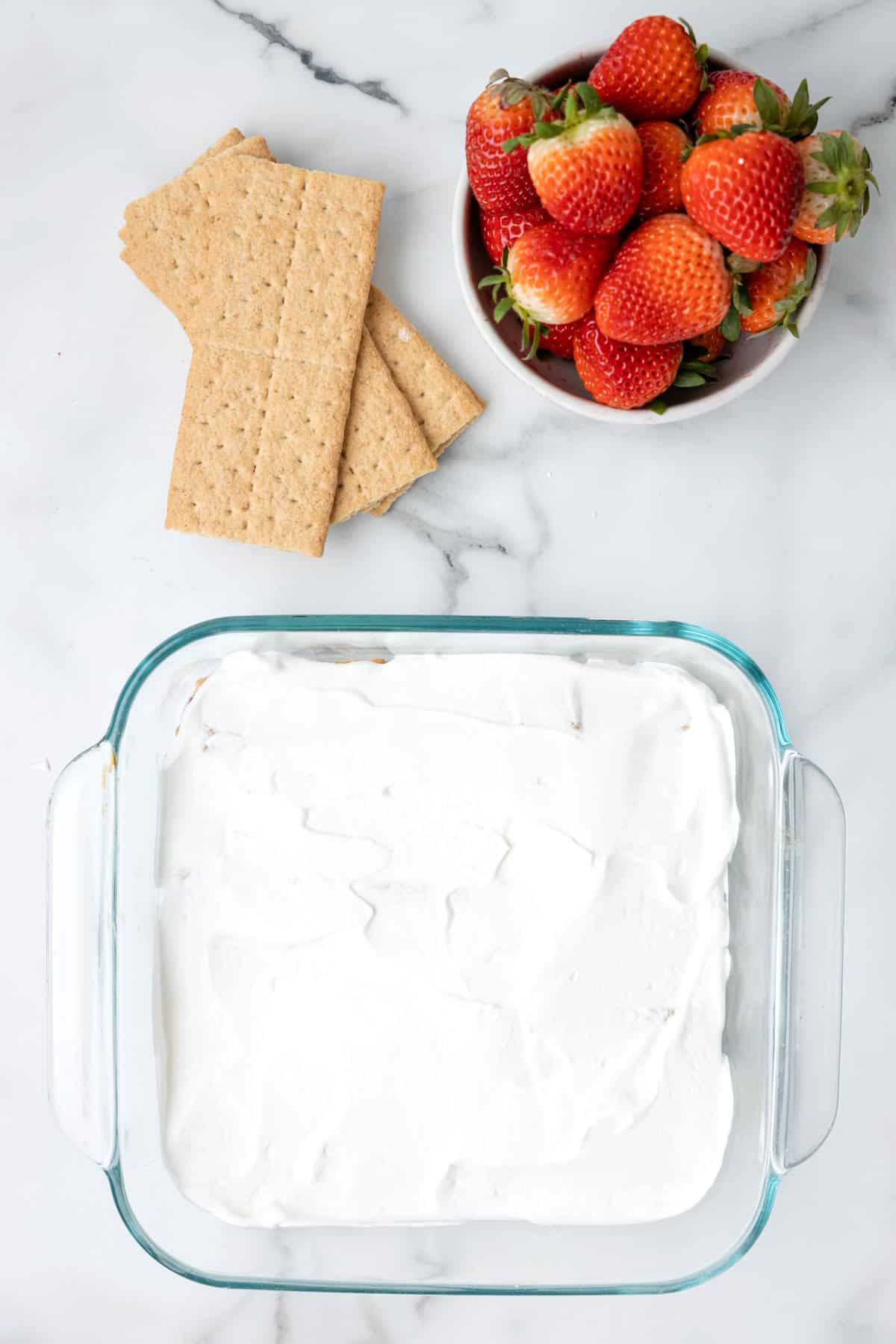 Cool whip layer in a baking dish