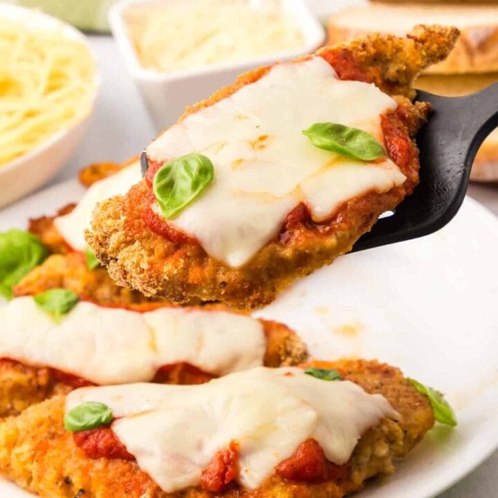 Oven Baked Chicken Parmesan is a delicious parmesan breaded chicken breast recipe topped with marinara and mozzarella cheese.