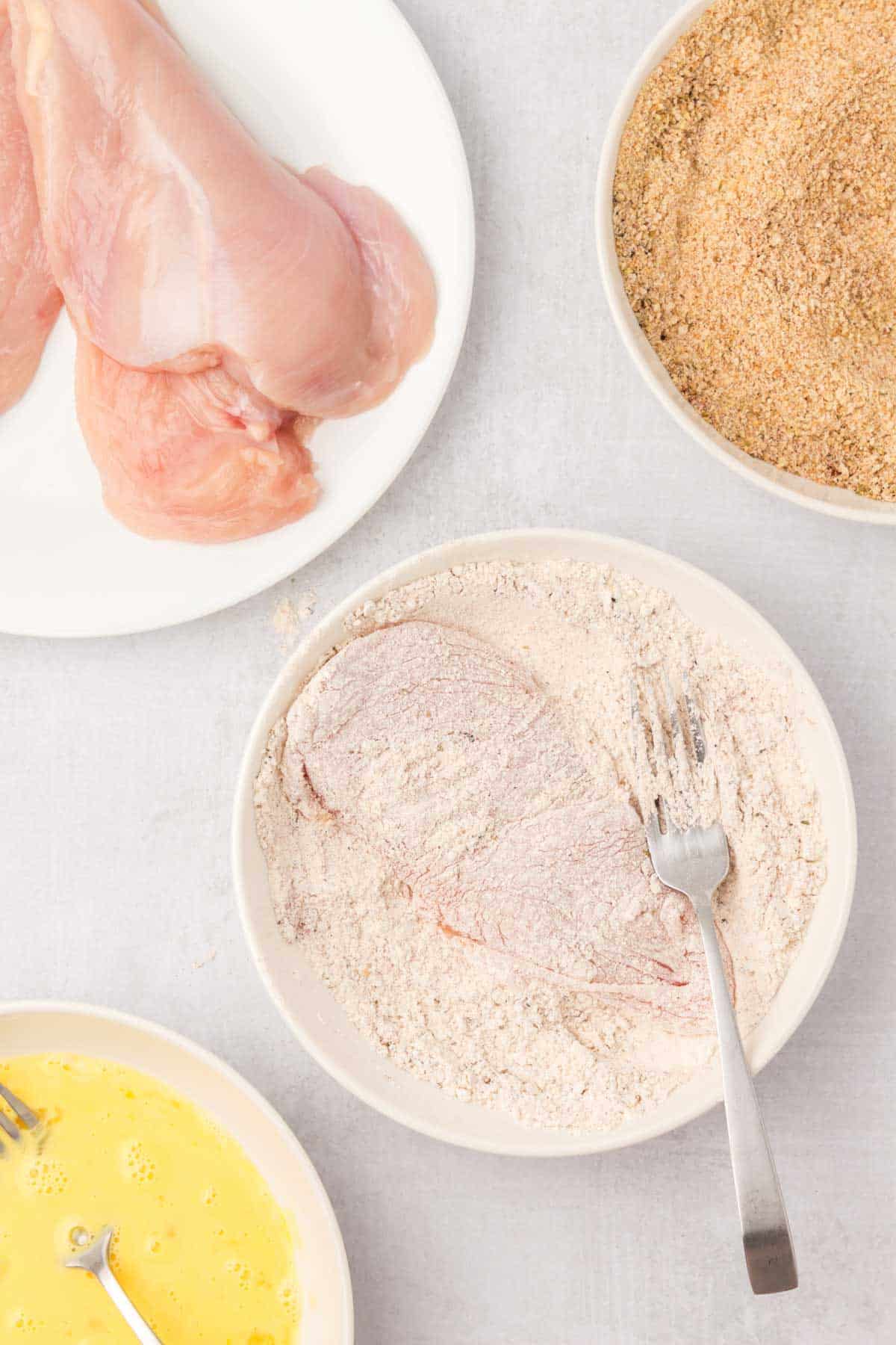 chicken breast coated in flour mixture