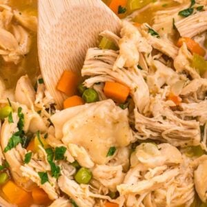 Chicken and Dumplings with Tortillas is a twist on a classic comfort food recipe loaded with shredded chicken breast, carrots, celery, onion, peas and flour tortilla recipes all cooked in a delicious chicken broth.