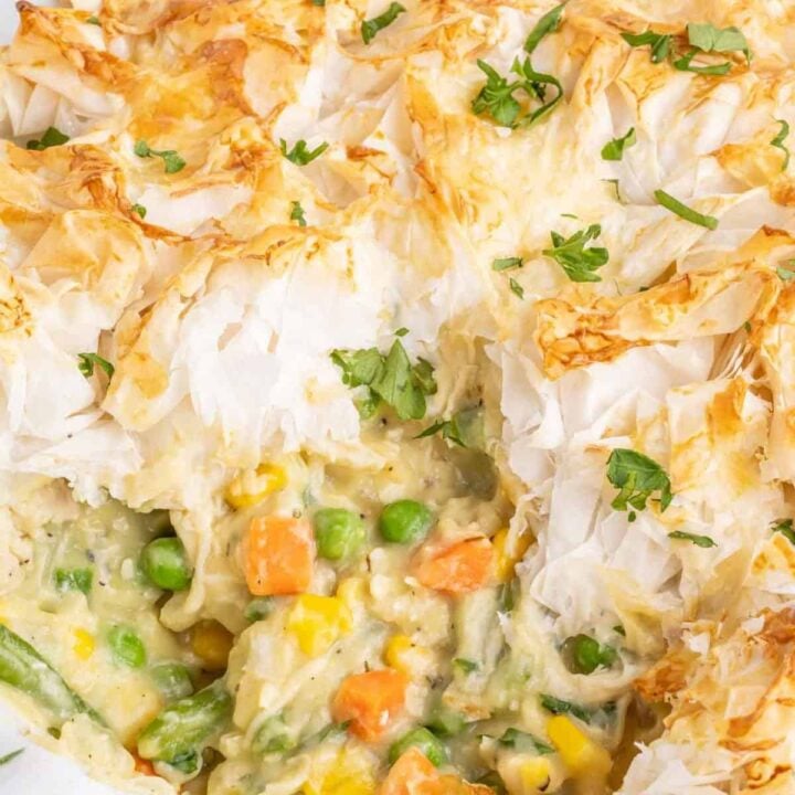 Chicken Pot Pie with Phyllo Dough is a hearty dinner recipe using shredded rotisserie chicken, frozen mixed vegetables, cream of chicken soup and sheets of phyllo dough.