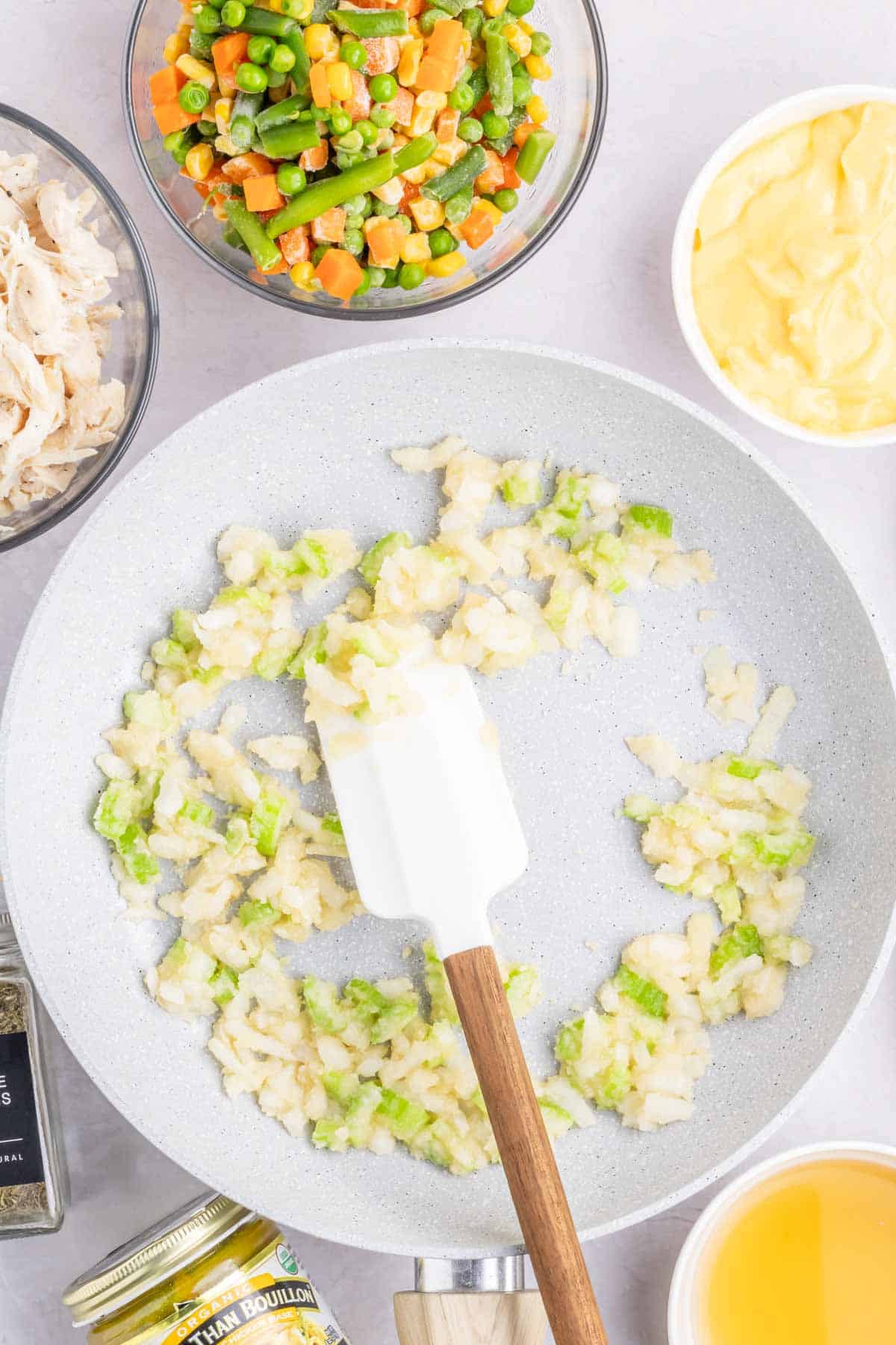 flour, onions, celery and butter cooking in a skillet
