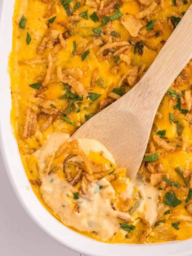 Green Bean Casserole with Velveeta is a classic holiday side dish made with canned green beans, cream of mushroom soup, Velveeta, shredded cheddar cheese and French's crispy fried onions.