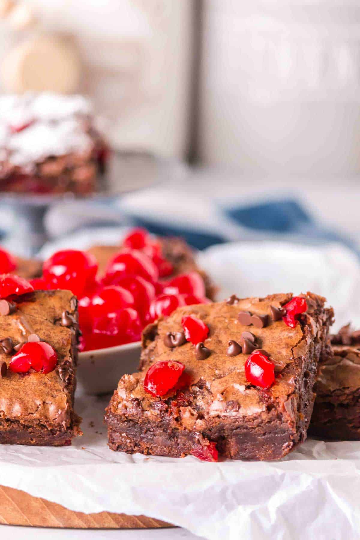 Maraschino Cherry Brownies are decadent chocolate brownies made with boxed brownie mix, chocolate chips, maraschino cherries and instant coffee.