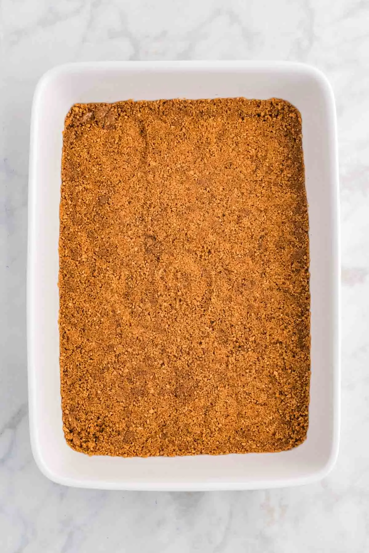 gingersnap crust in the bottom of a baking dish
