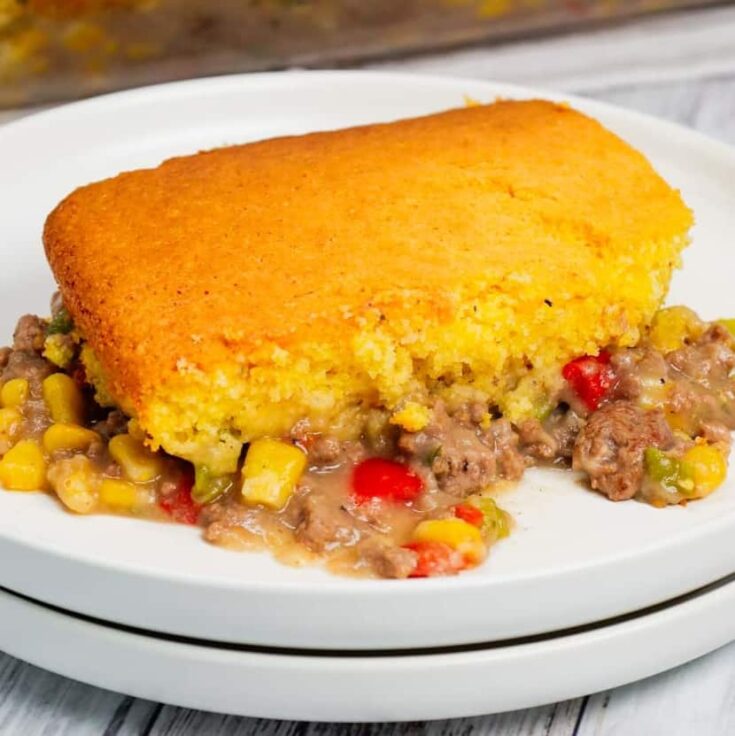 Shepherd's Pie with Cornbread is a Tex-Mex twist on a classic dish using Jiffy corn muffin mix, diced red and green peppers, corn, ground beef, instant mashed potatoes and chopped green onions.