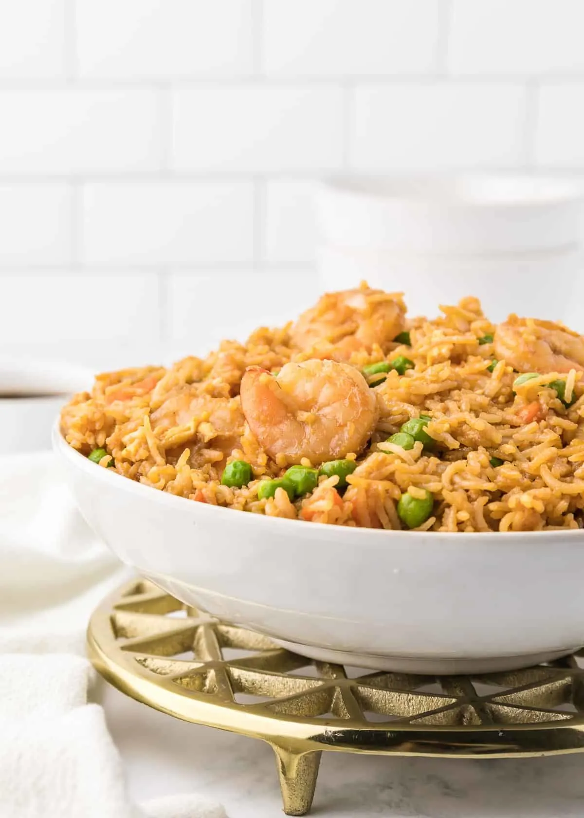 Easy Shrimp Fried Rice is a delicious dinner recipe loaded with shrimp, peas, carrots, onions, eggs, rice and soy sauce.