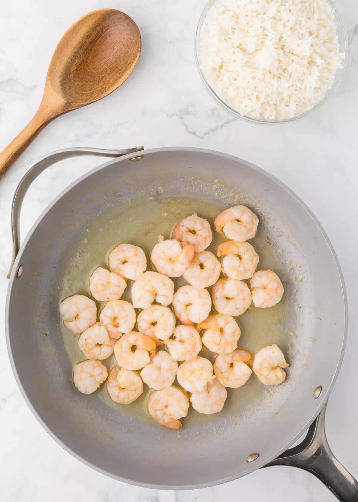 shrimp cooking in a skillet