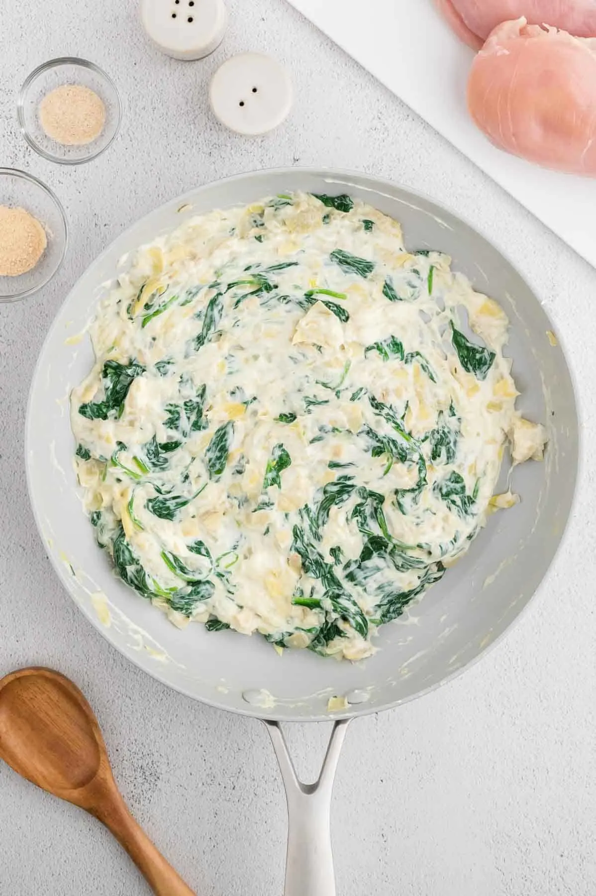 creamy spinach and artichoke mixture in a skillet