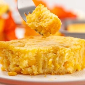 Corn Soufflé is a moist and delicious corn casserole recipe made with canned whole kernel corn, cream corn, sour cream, egg, Jiffy corn muffin mix and melted butter.