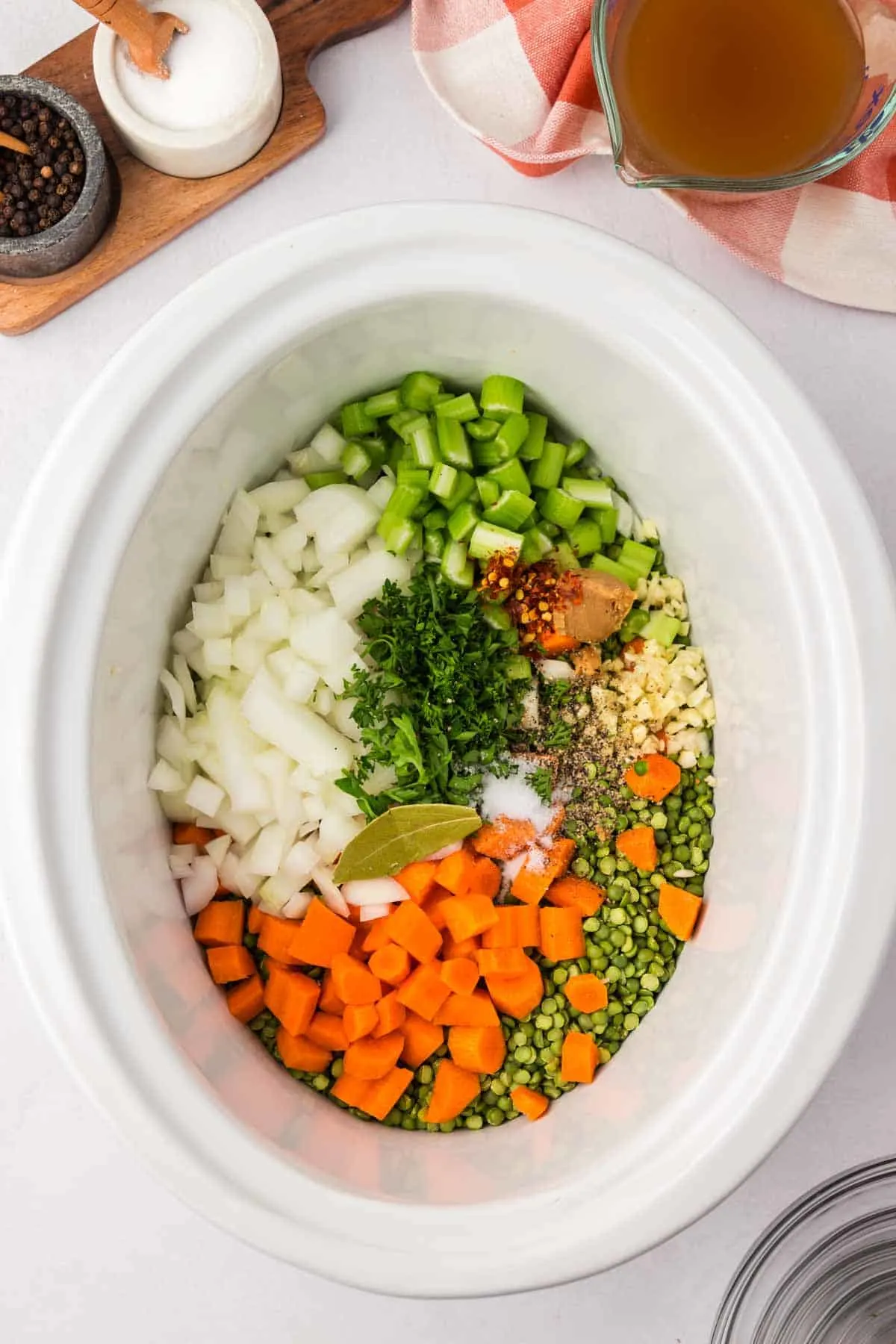 chopped carrots, onions, celery, parsley, minced garlic and split peas in a crock pot