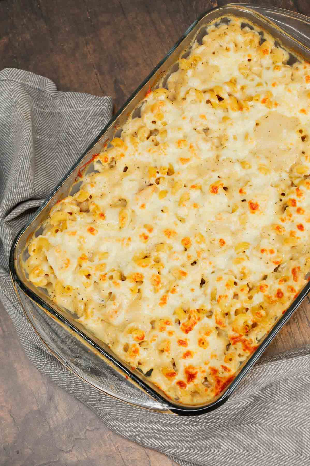 Dump and Bake Chicken Alfredo is an easy one dish meal made with cavatappi pasta, jarred alfredo sauce, condensed cream of bacon soup, chicken broth, chopped rotisserie chicken and mozzarella cheese.