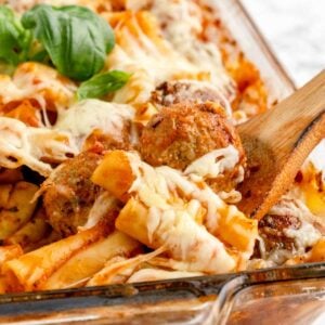 Dump and Bake Meatball Pasta Casserole is an easy dinner recipe with ziti noodles, chicken stock, pasta sauce, Italian seasoning and turkey meatballs all cooked together in one dish and then topped with mozzarella cheese.