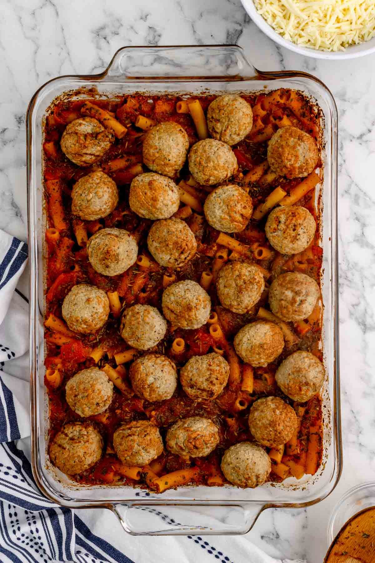 meatballs and ziti after baking in a casserole dish