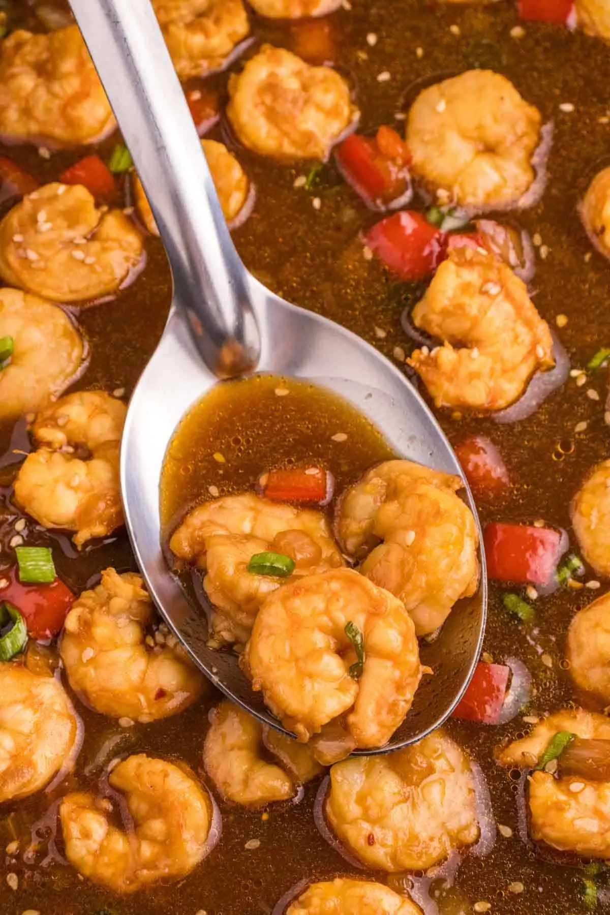 Mongolian Shrimp is a delightful dish with large shrimp cooked in a rich seasoned soy sauce with a bit of a kick from the addition of some chili garlic sauce.