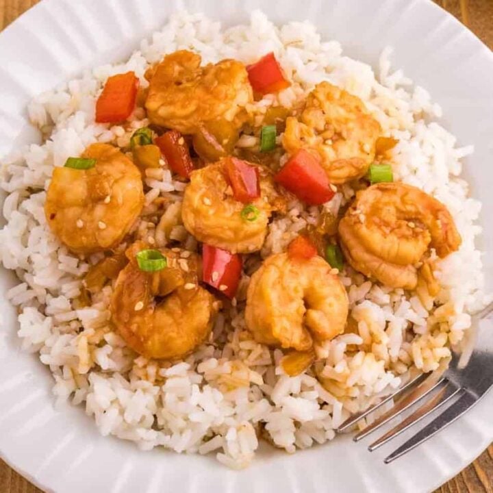 Mongolian Shrimp is a delightful dish with large shrimp cooked in a rich seasoned soy sauce with a bit of a kick from the addition of some chili garlic sauce.