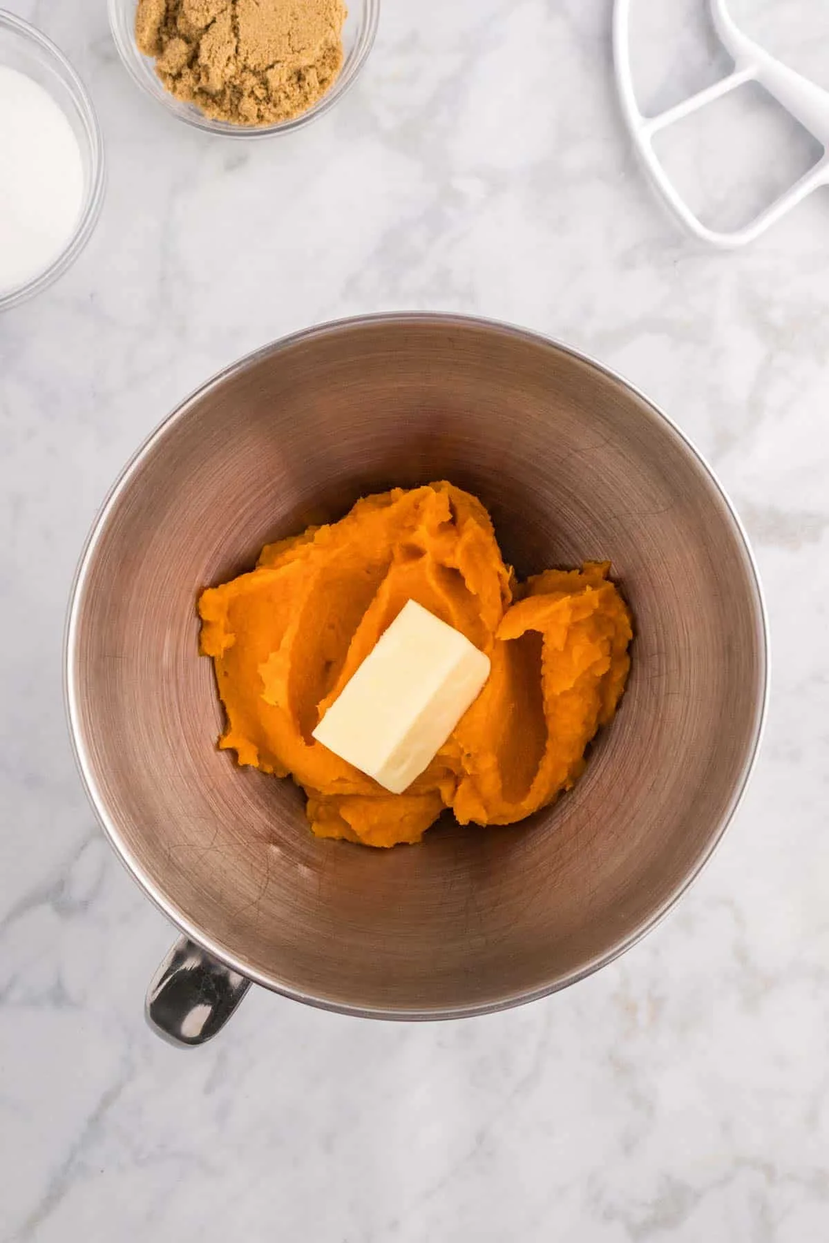 softened butter added to bowl with whipped sweet potato 