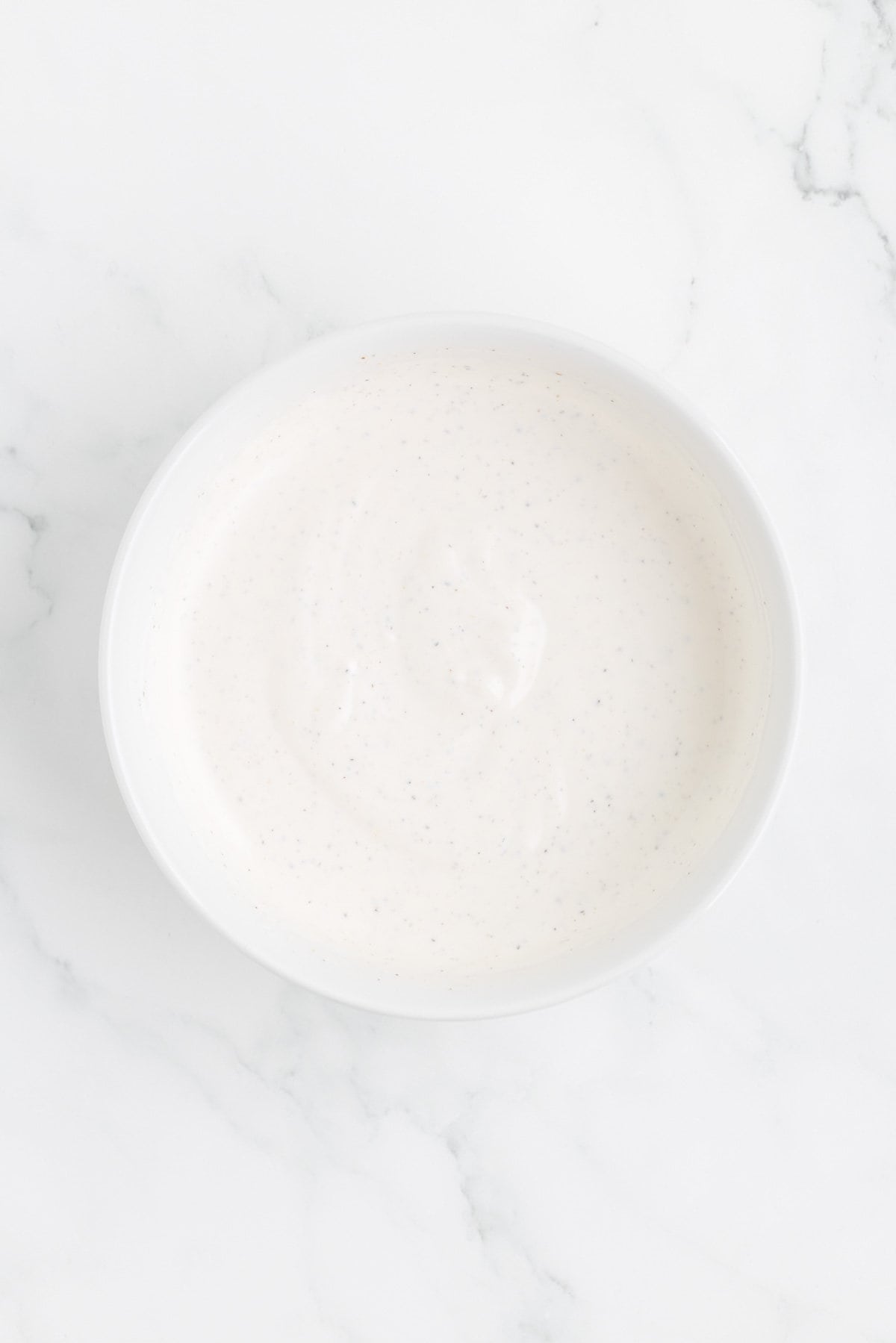 mayo and sour cream dressing in a mixing bowl