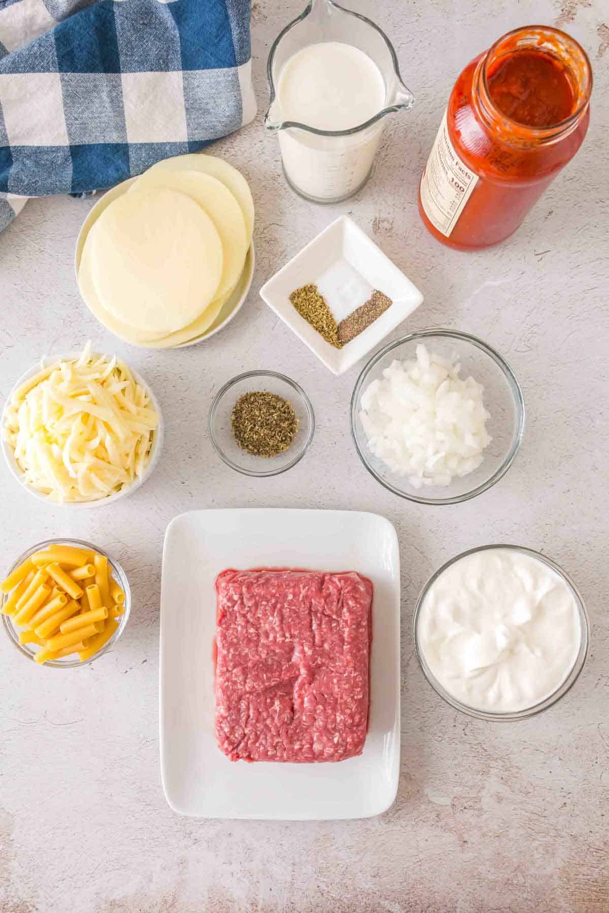 baked ziti ingredients in a prep bowls