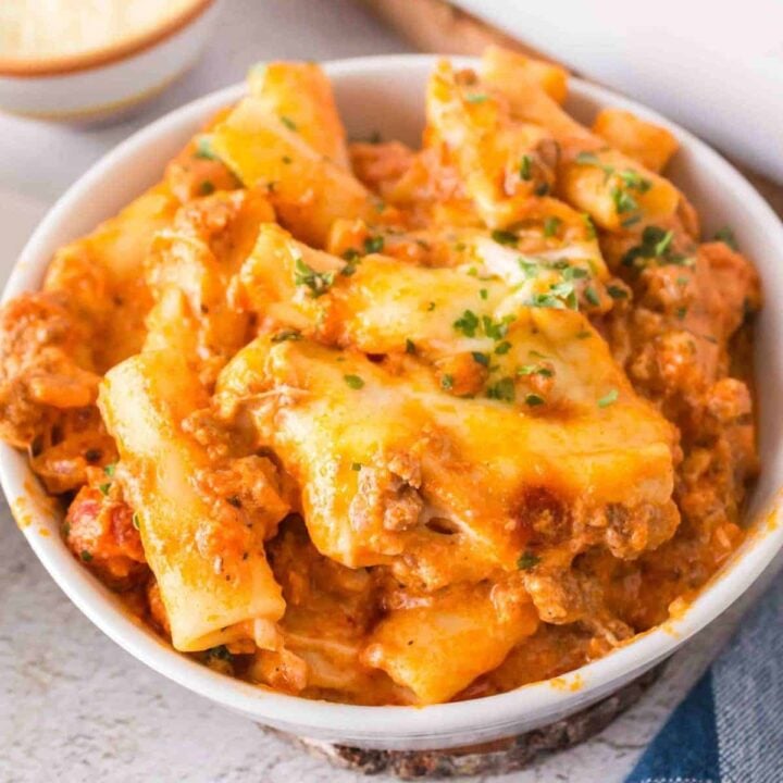 Baked Ziti with Ground Beef is a hearty baked pasta recipe loaded with ground beef, marinara sauce, sour cream, heavy cream, provolone and mozzarella cheese.