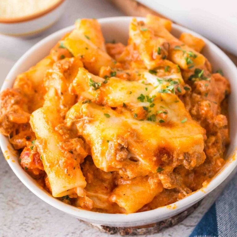 Baked Ziti with Ground Beef is a hearty baked pasta recipe loaded with ground beef, marinara sauce, sour cream, heavy cream, provolone and mozzarella cheese.