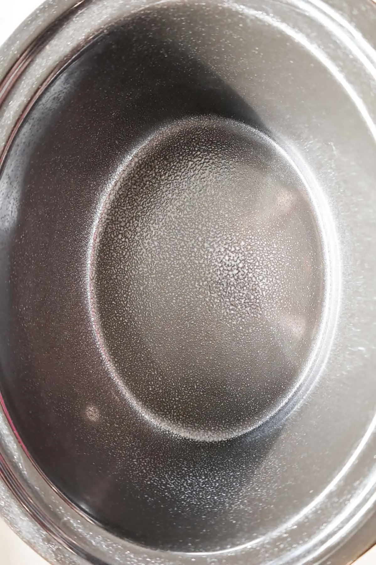 inside of Crock Pot sprayed with cooking spray