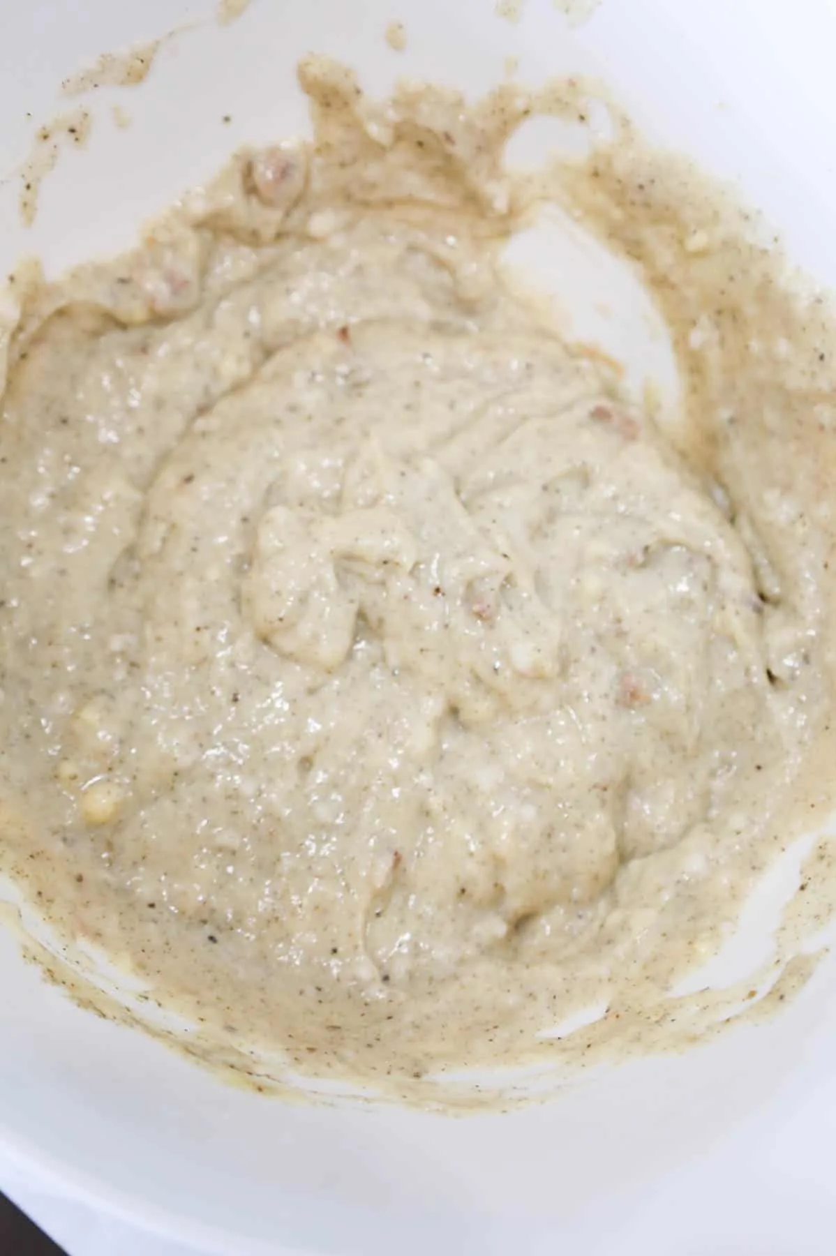 cream of mushroom soup, cream of chicken soup and seasonings mixture in a mixing bowl