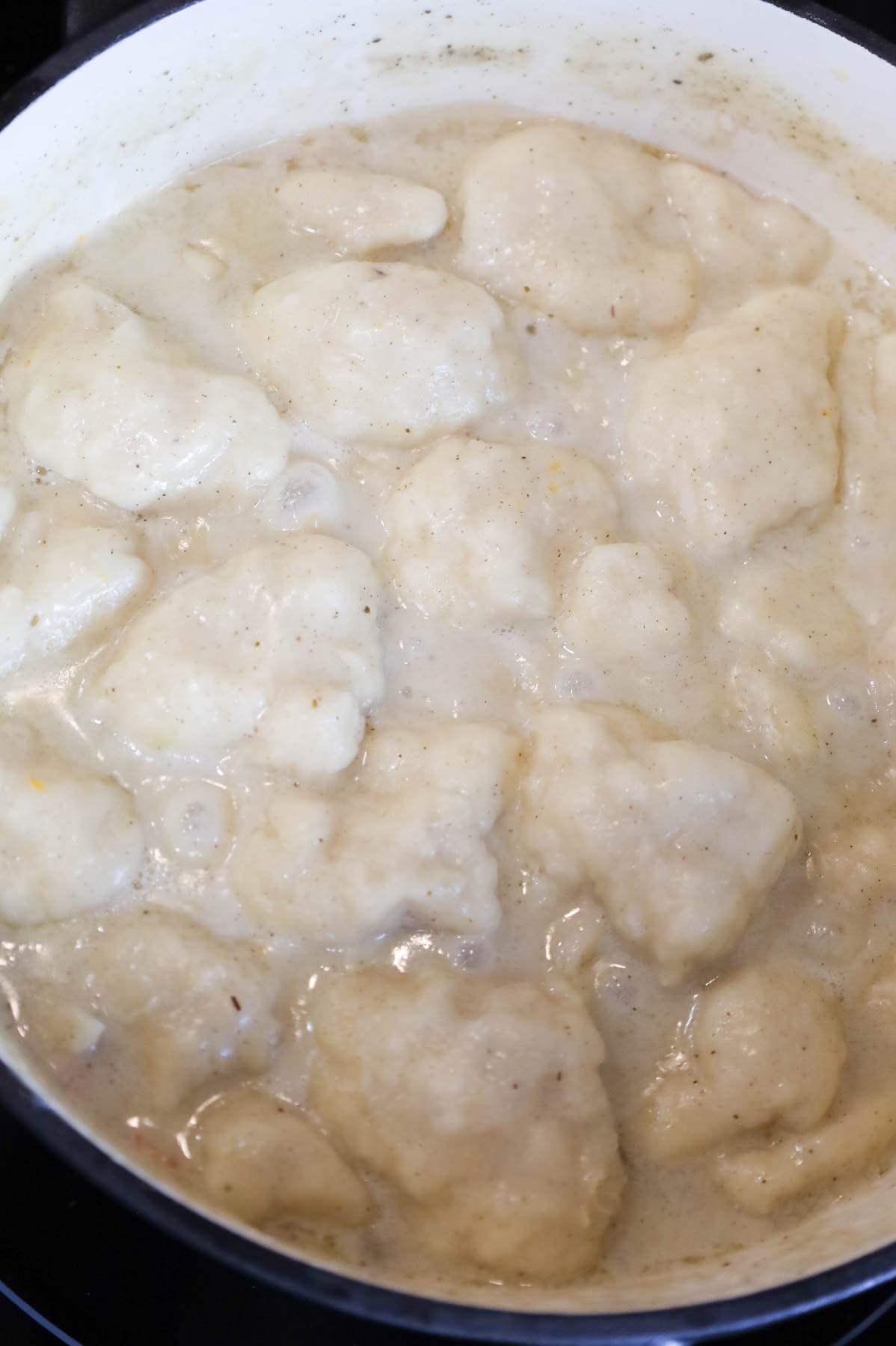 chicken and dumplings after cooking in Dutch oven