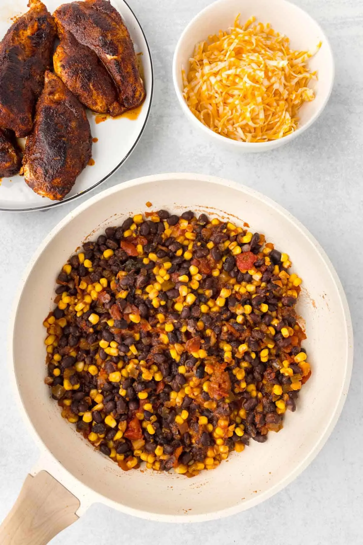 salsa, corn and black bean mixture in a skillet