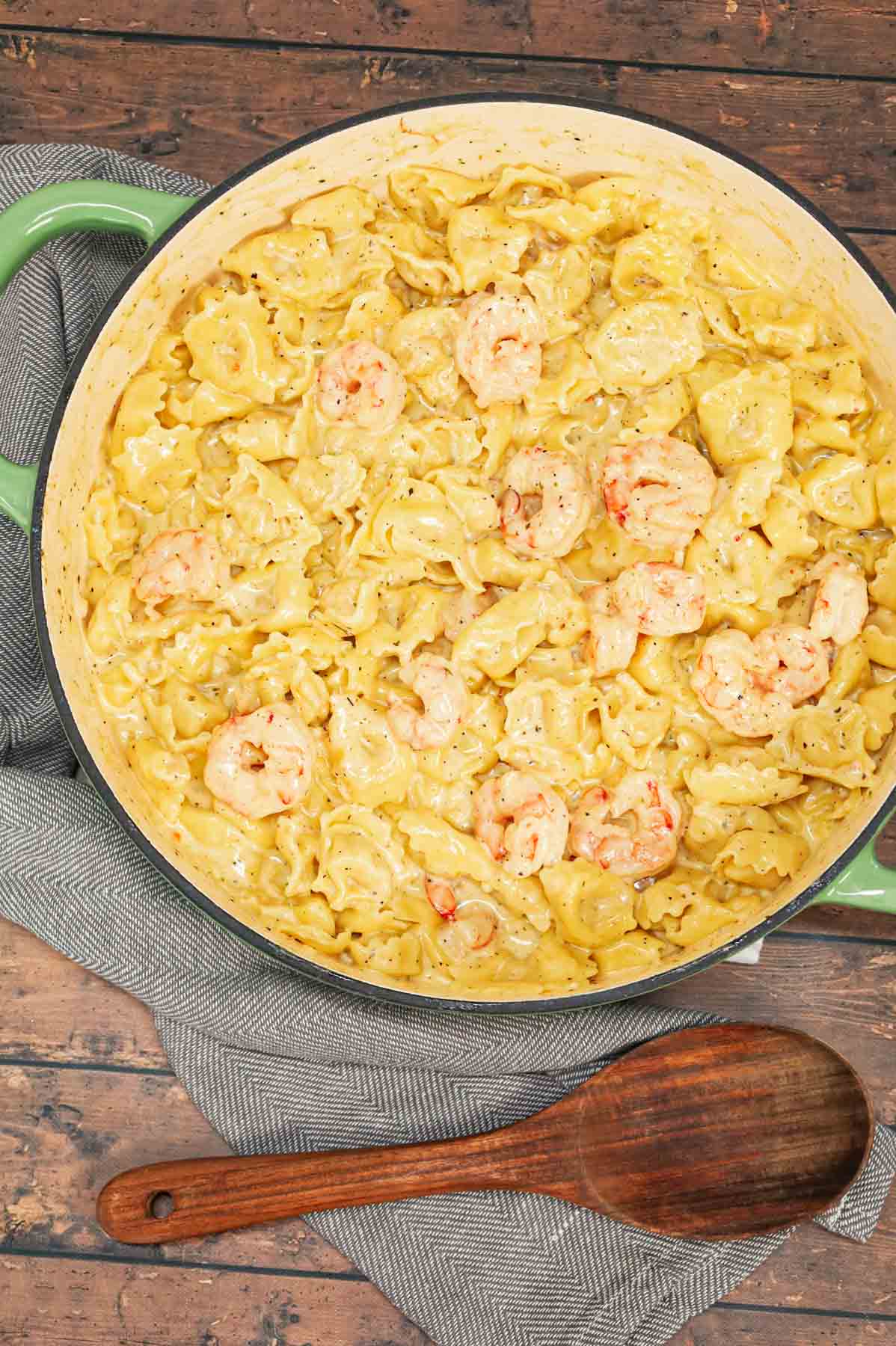 Shrimp Tortellini Alfredo is a delicious seafood pasta recipe with cheese tortellini and tender shrimp all tossed in a creamy garlic parmesan sauce.