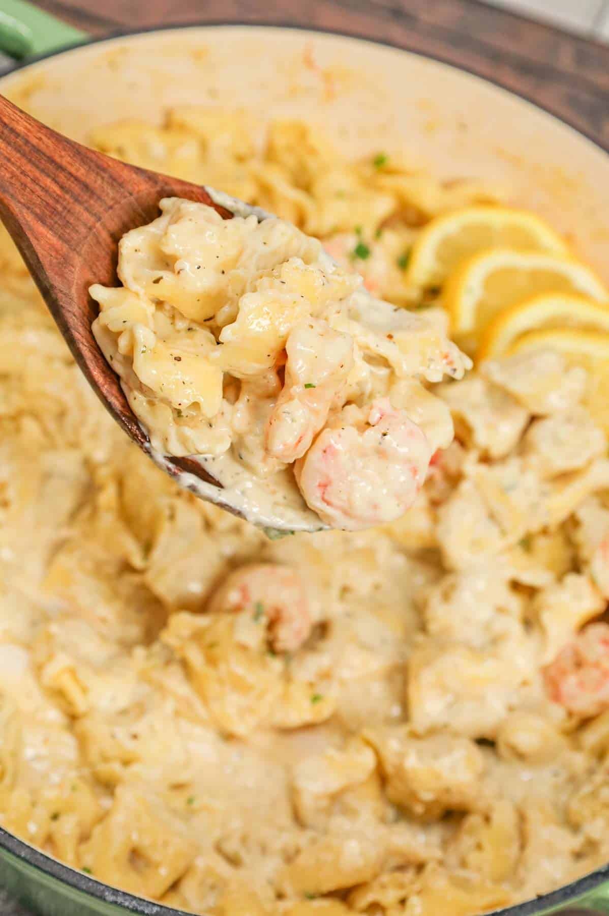 Shrimp Tortellini Alfredo is a delicious seafood pasta recipe with cheese tortellini and tender shrimp all tossed in a creamy garlic parmesan sauce.