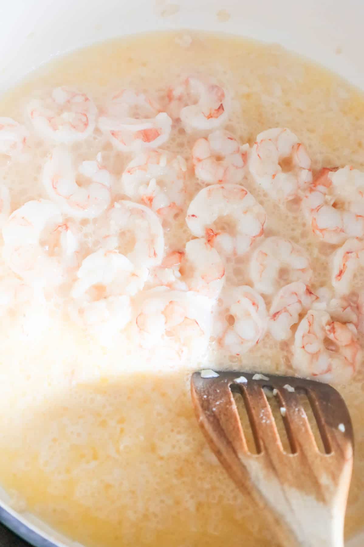 cooked shrimp in a skillet with butter