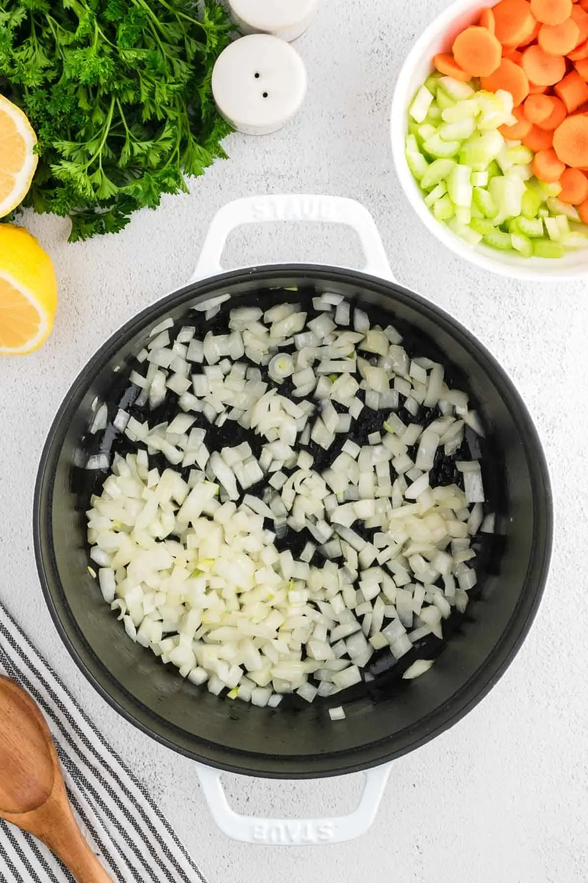diced onions cooking in a pot