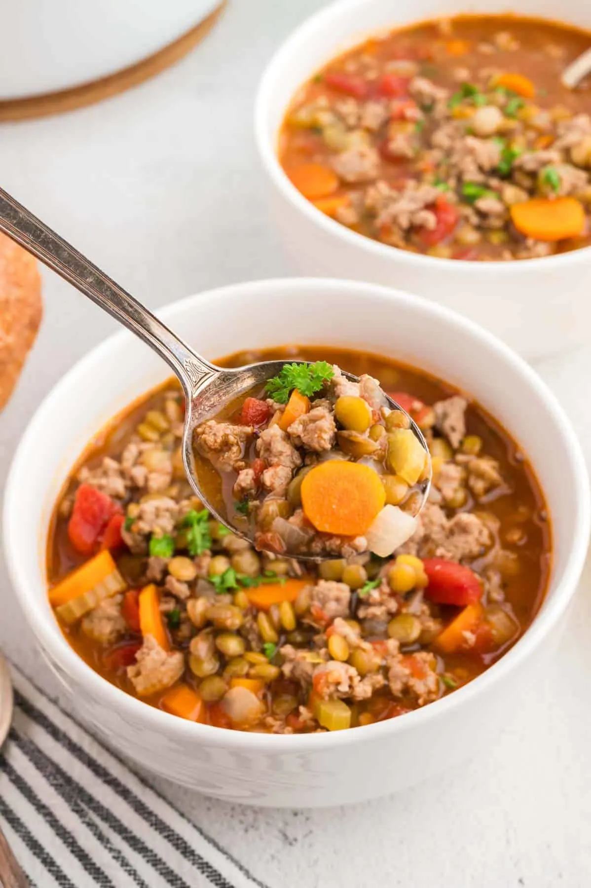 Turkey Lentil Soup is a hearty soup loaded with ground turkey, brown lentils, celery, carrots, onion and diced tomatoes.