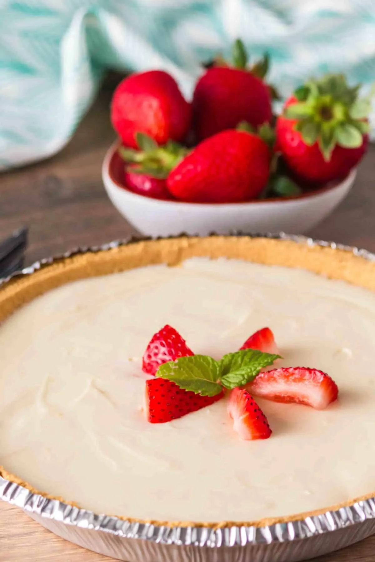 3 Ingredient Cheesecake is an easy no bake dessert recipe made with a graham pie crust, cream cheese and sweetened condensed milk.