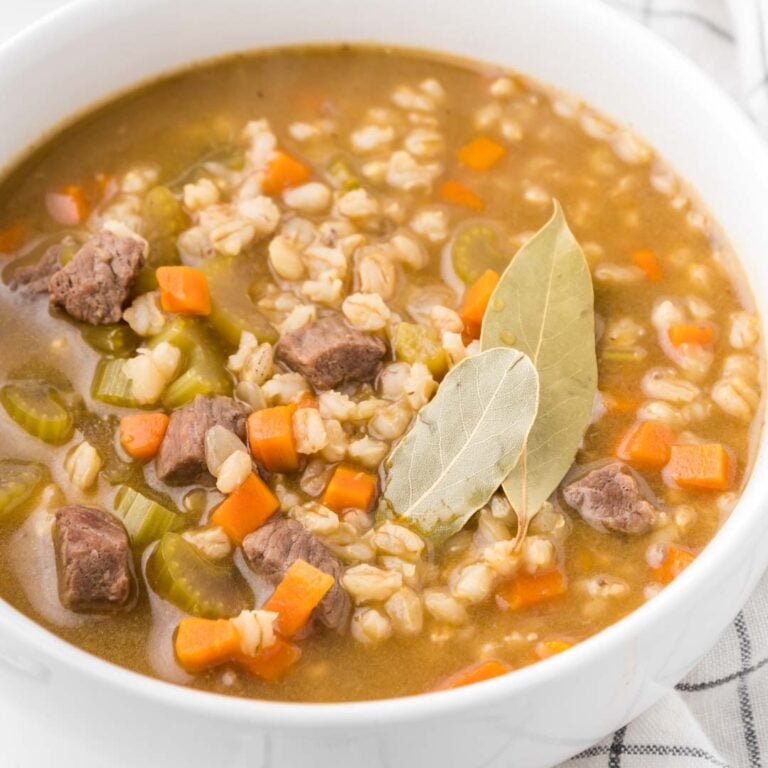 Beef Barley Soup is a hearty soup recipe loaded with chunks of beef, barley, carrots, onion and celery all in a flavourful beef broth with red wine.
