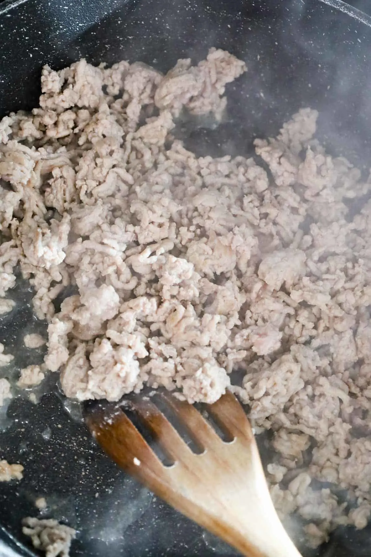 cooked ground chicken in a skillet