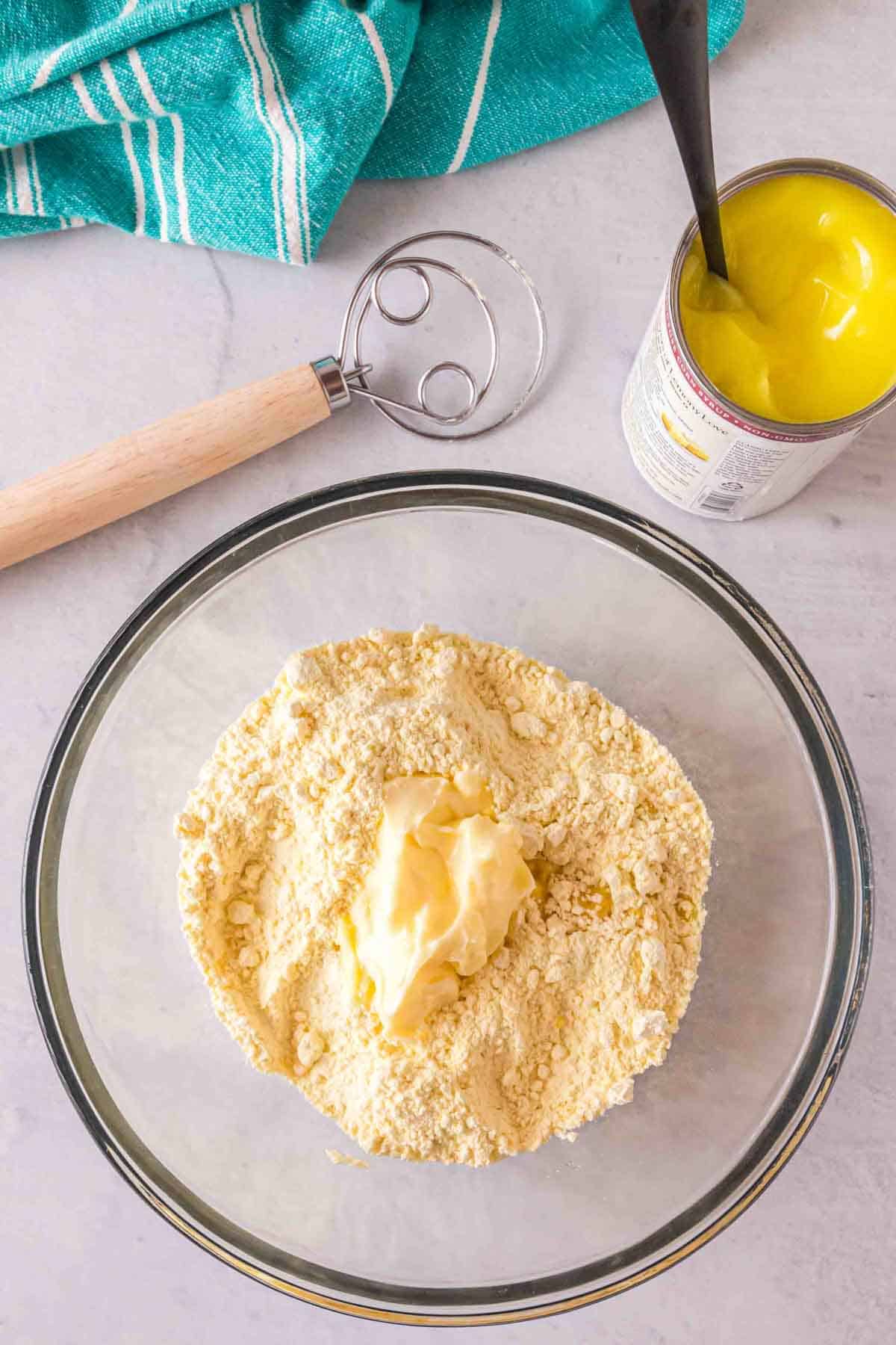 softened butter and lemon cake mix in a mixing bowl