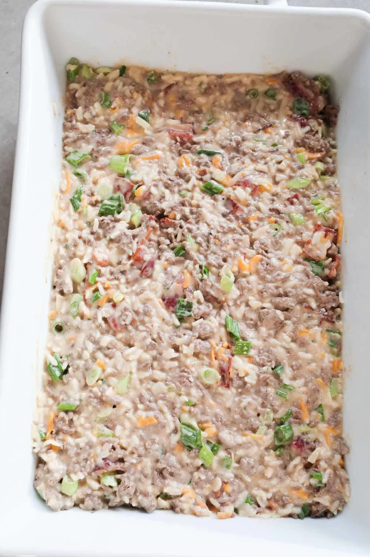 creamy ground beef and rice mixture in a baking dish