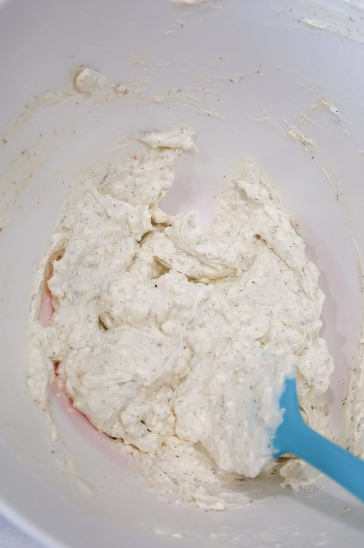 sour cream, cream cheese and sour cream mixture in a mixing bowl