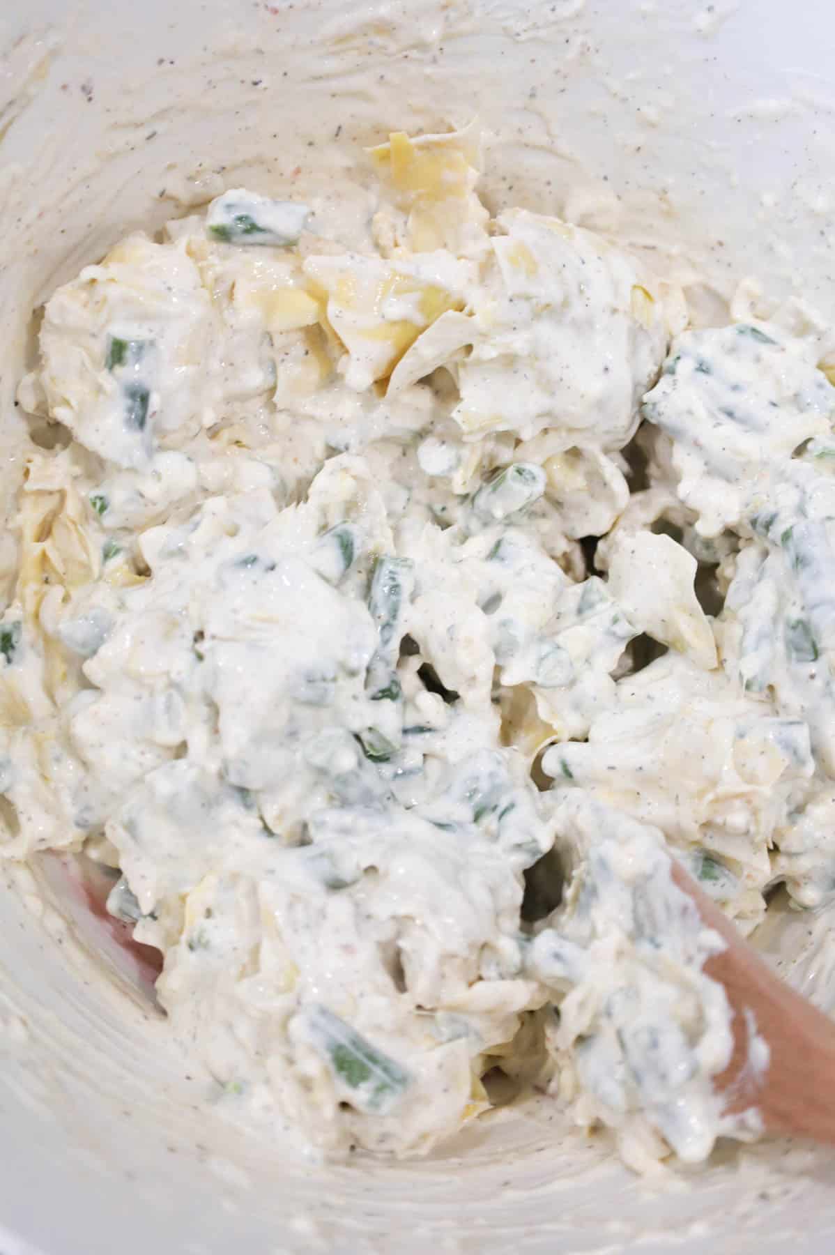 creamy green bean and artichoke mixture in a bowl