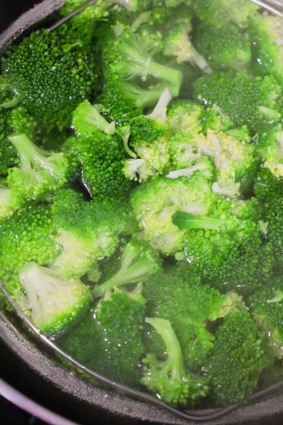 broccoli florets in boiling water
